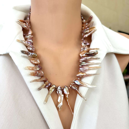 Front view of pink Biwa pearl necklace on mannequin, bold statement design