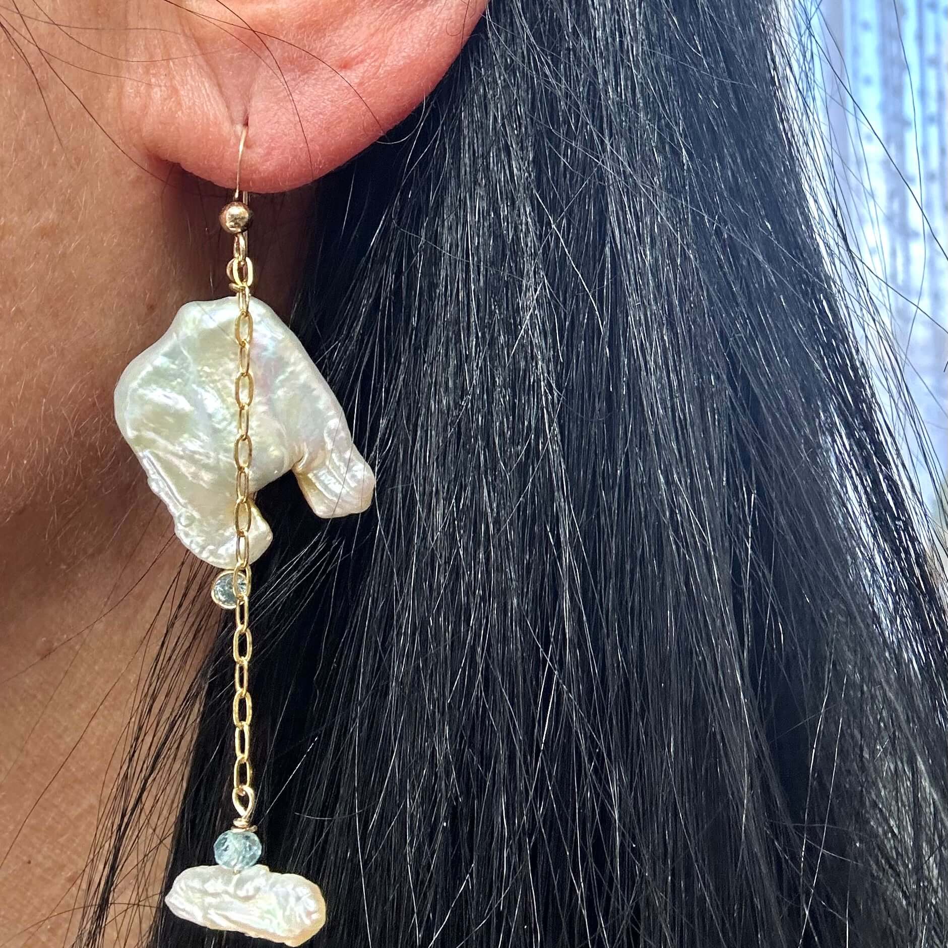 Boho pearl earrings gold filled worn on woman’s ear — elegant handcrafted square pearl and blue gemstone jewelry by Loulia Pearl Jewelry