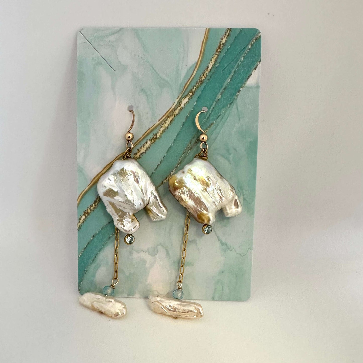 Boho pearl earrings gold filled against azure background — handcrafted square pearl and blue topaz earrings by Loulia Pearl Jewelry