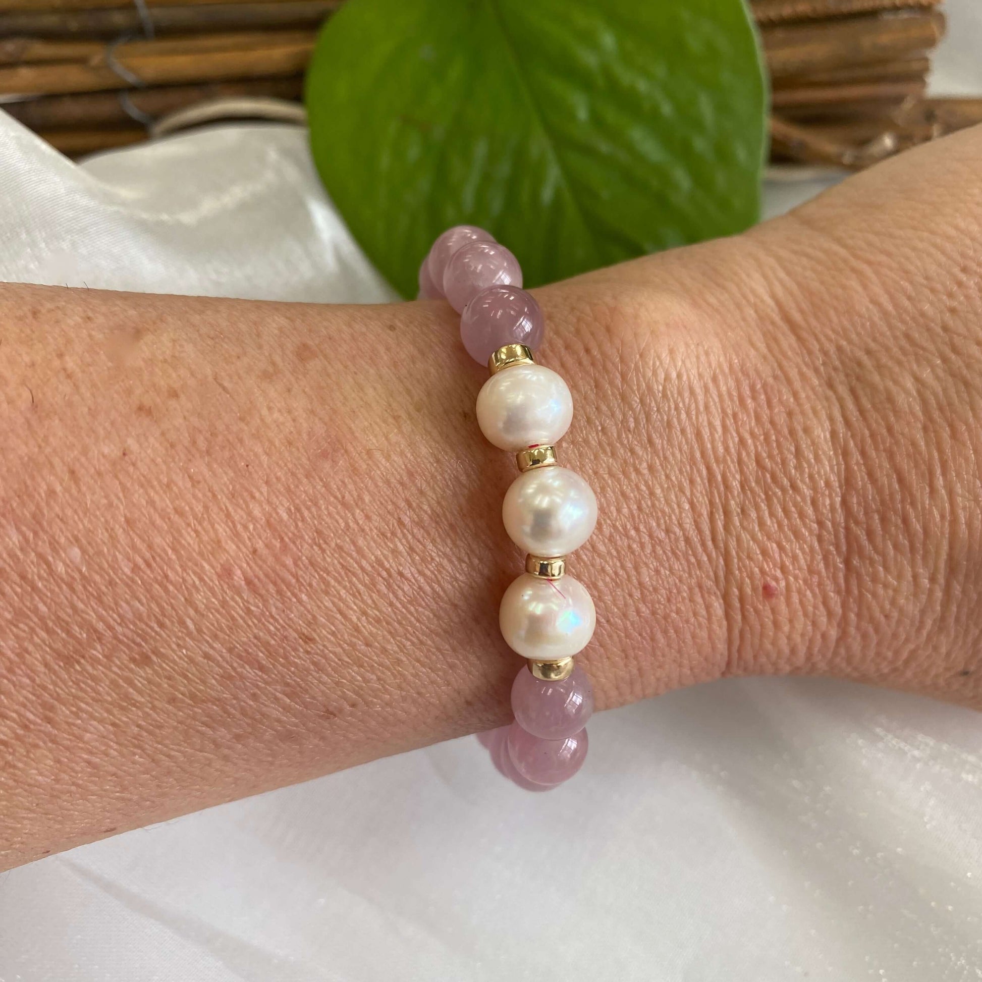 Rose Quartz Pearl Bracelet shown on model’s wrist – natural light close-up
