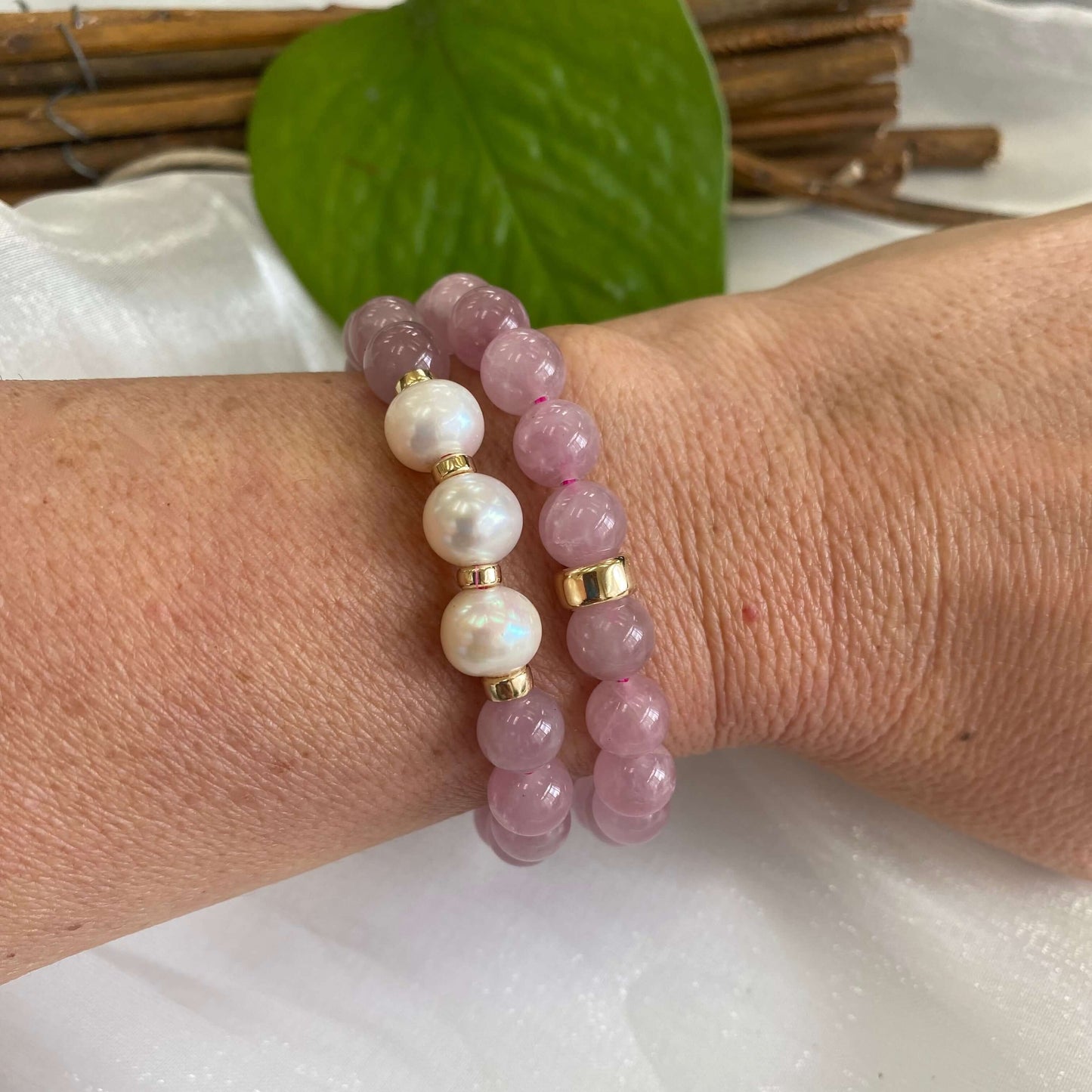 Rose Quartz Pearl Bracelet pair worn together on model’s wrist – stacked look