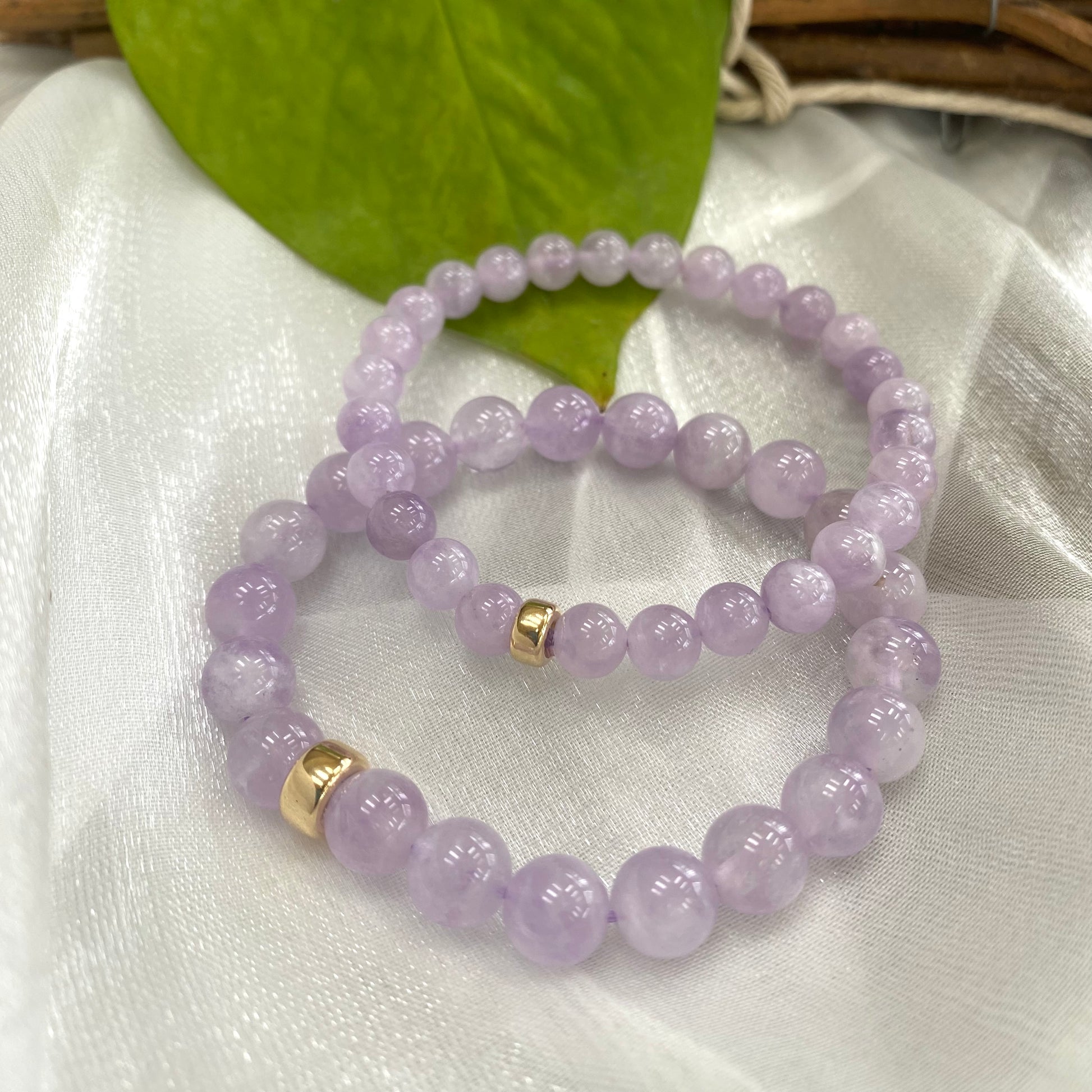 Lavender Amethyst Bracelet displayed as two bracelets on white cloth – product detail