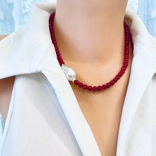 Load image into Gallery viewer, red coral and one large baroque pearl on the side of the necklace with sterling silver details, measuring 18 inches. This vibrant jewelry piece makes a thoughtful gift for her.
