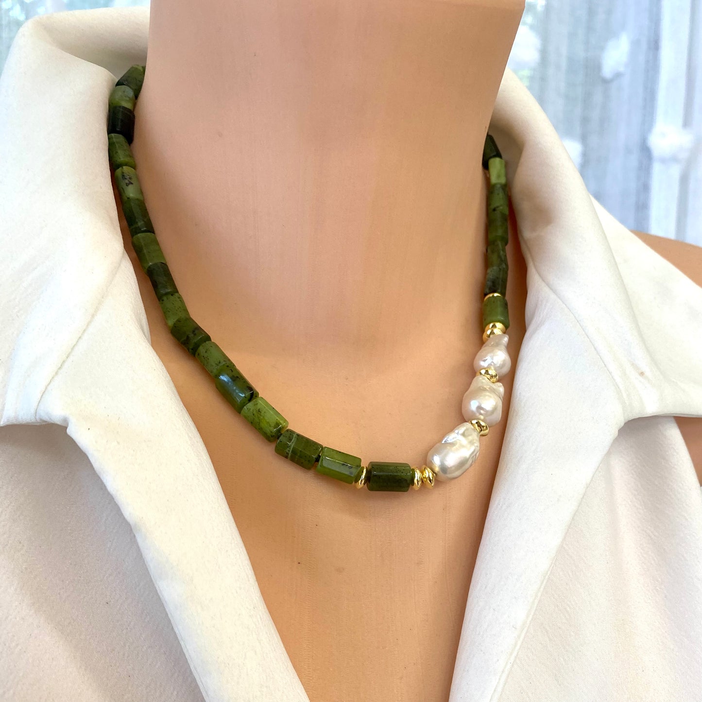 Canadian jade pearl necklace worn on neckline with green jade tube beads and freshwater pearls