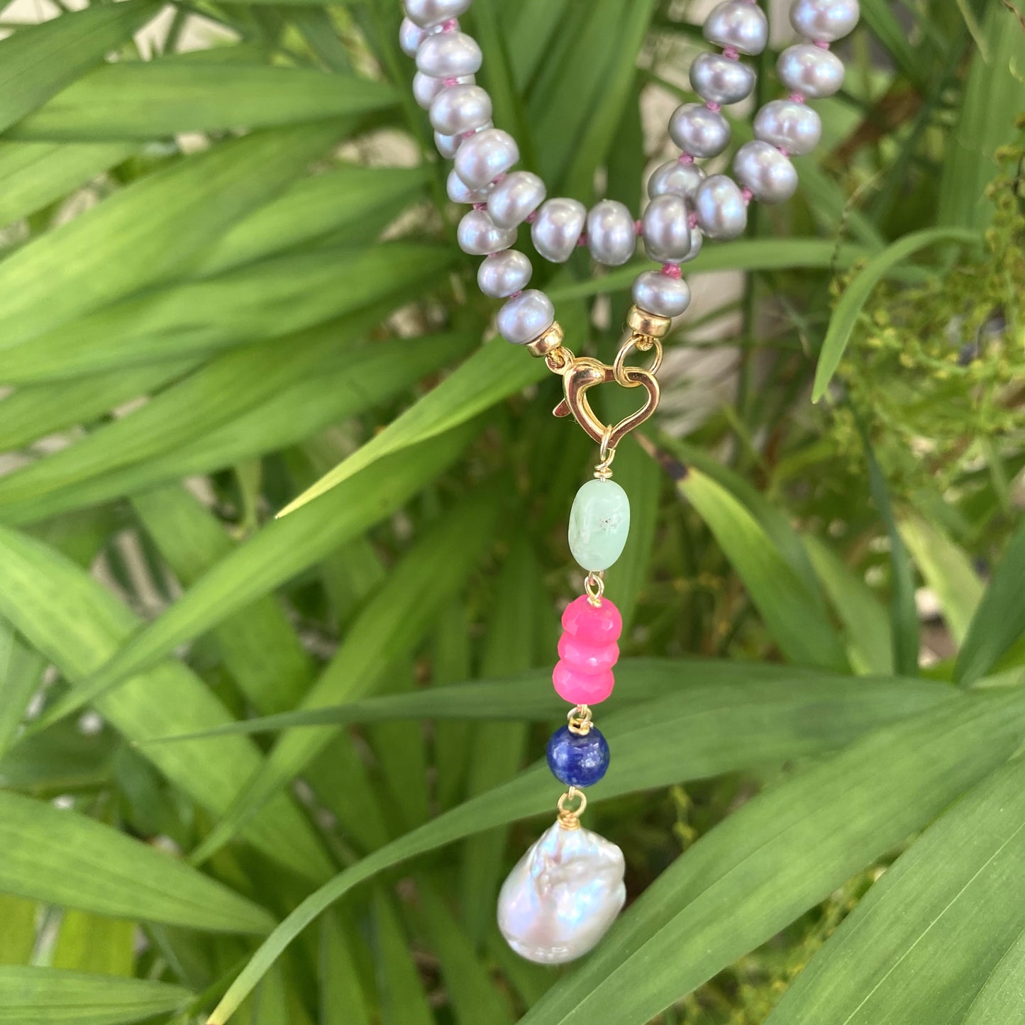 Grey pearl necklace with removable pendant showing baroque pearl with lapis lazuli, chrysoprase, and chalcedony