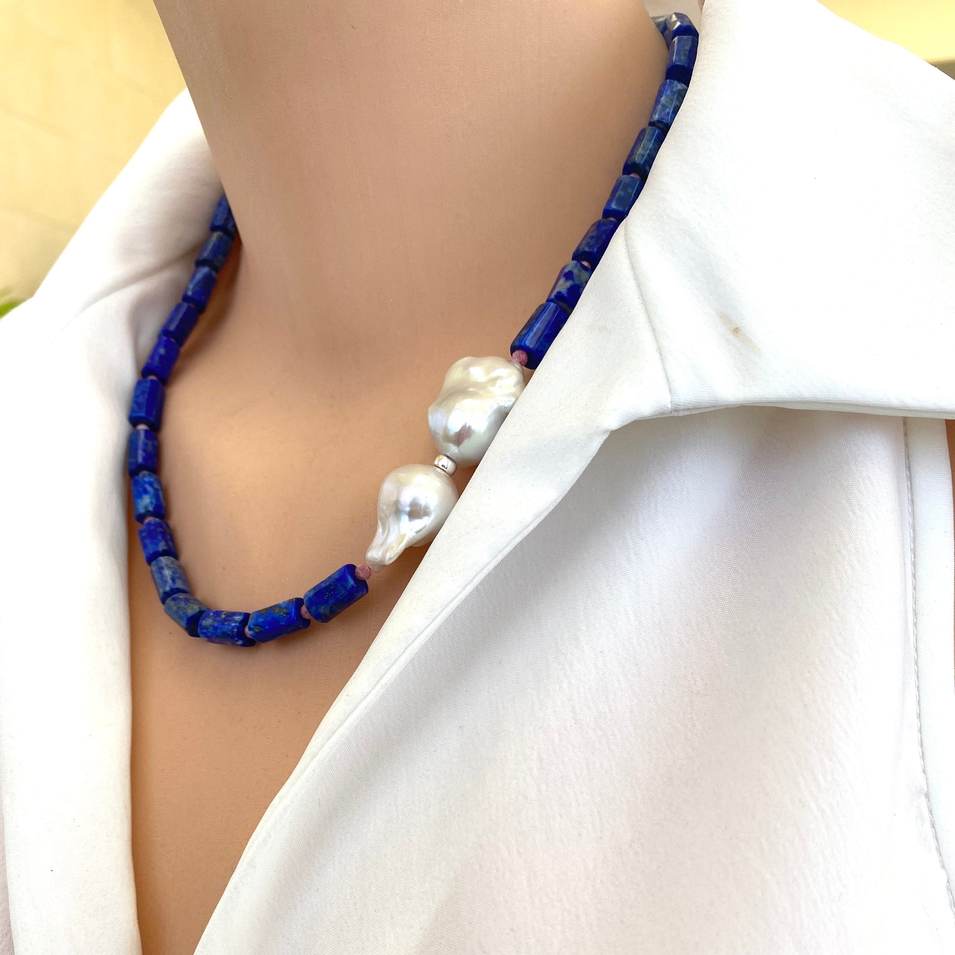 Angled view of Lapis Lazuli Pink Rhodonite Baroque Pearl Necklace on mannequin — handcrafted gemstone and pearl necklace by Loulia Pearl Jewelry