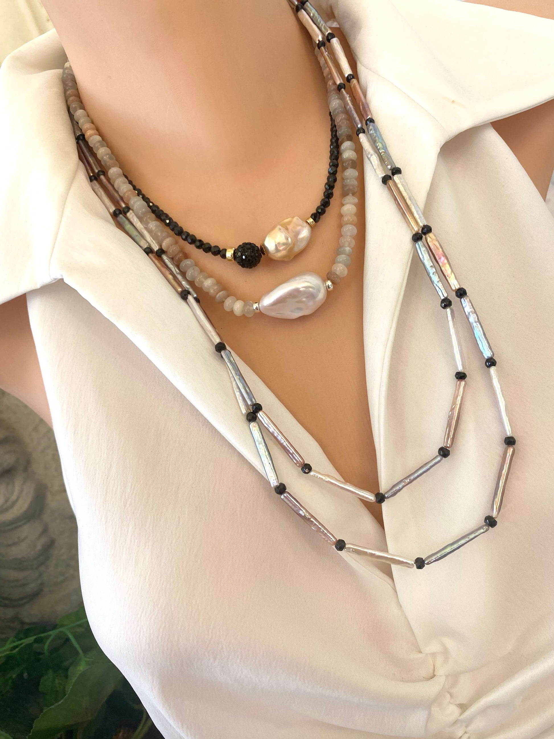 Pastel Stick Pearl Necklace showcasing stick pearls and black spinel beads on a model, handcrafted design in elegant colors.