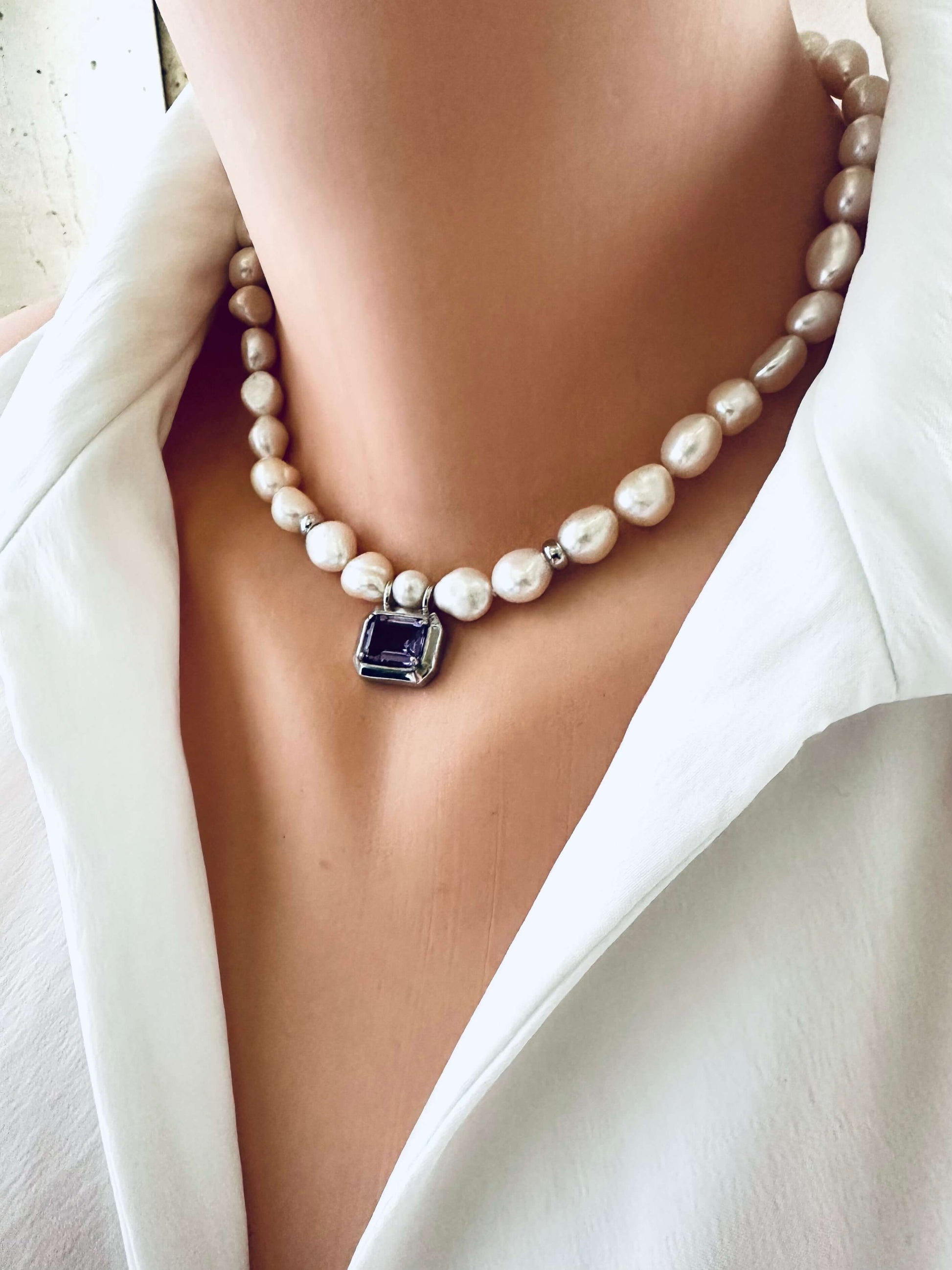 White Nugget Pearl Necklace with Amethyst Pendant – 'Viola' Collection elegantly worn, showcasing its luxurious design.