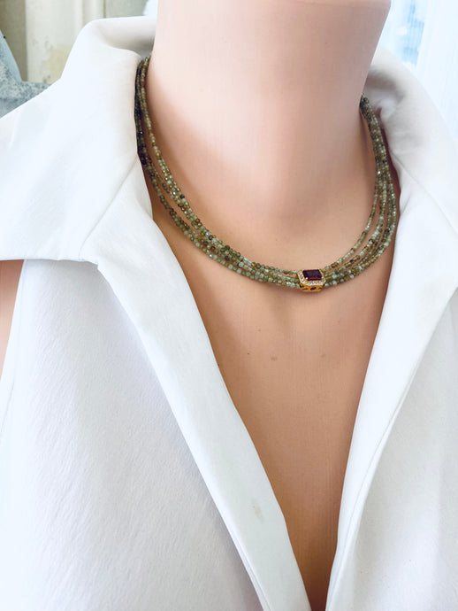 Green orange garnet necklace displayed on a mannequin, featuring multi-strand gold vermeil and 2 mm faceted garnet beads.