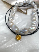 Load image into Gallery viewer, Black spinel and citrine pendant necklace displayed beside baroque pearl necklace
