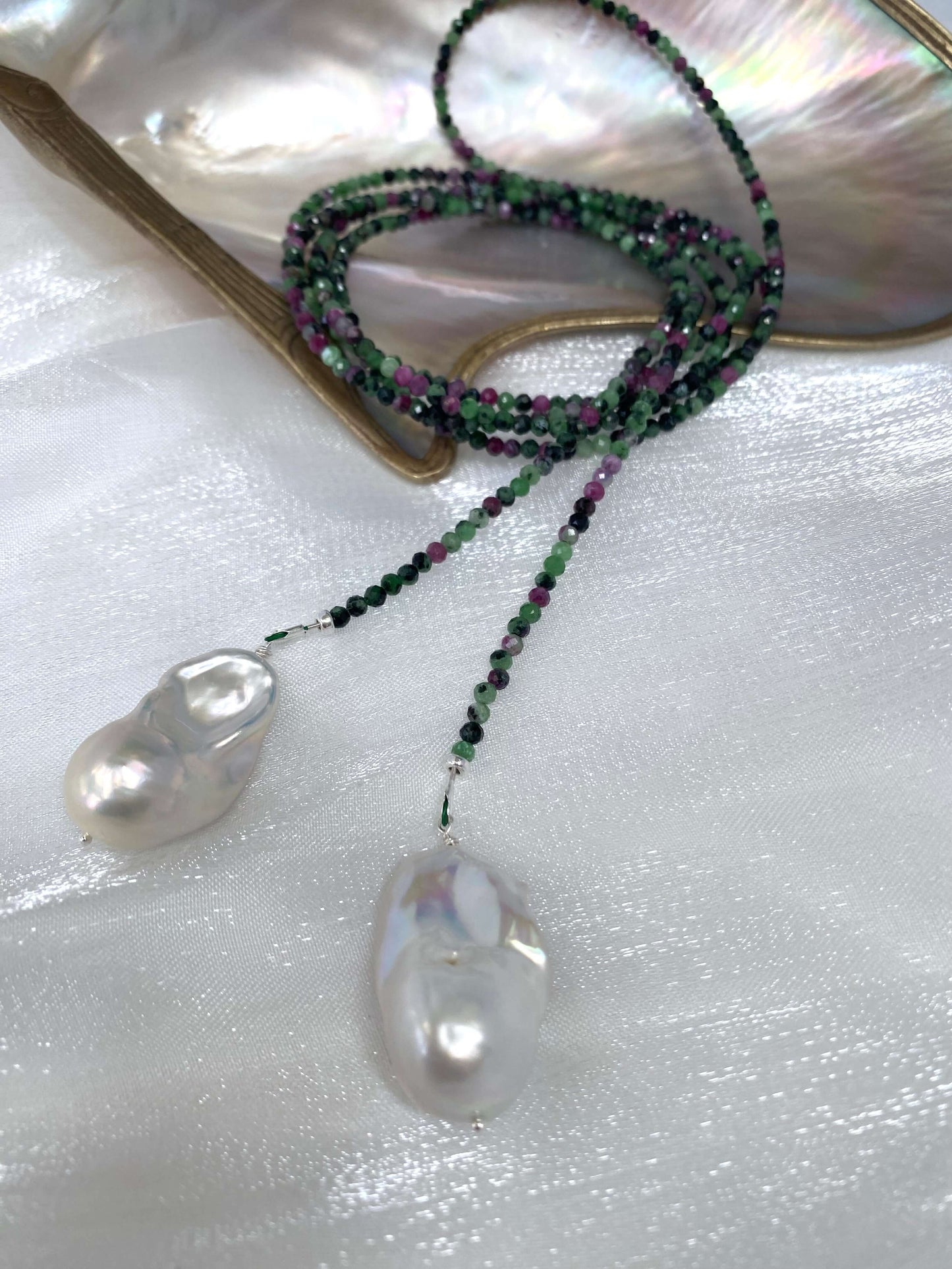 Ruby Zoisite Baroque Pearl Necklace showcasing lariat design with baroque pearls and colorful beads.