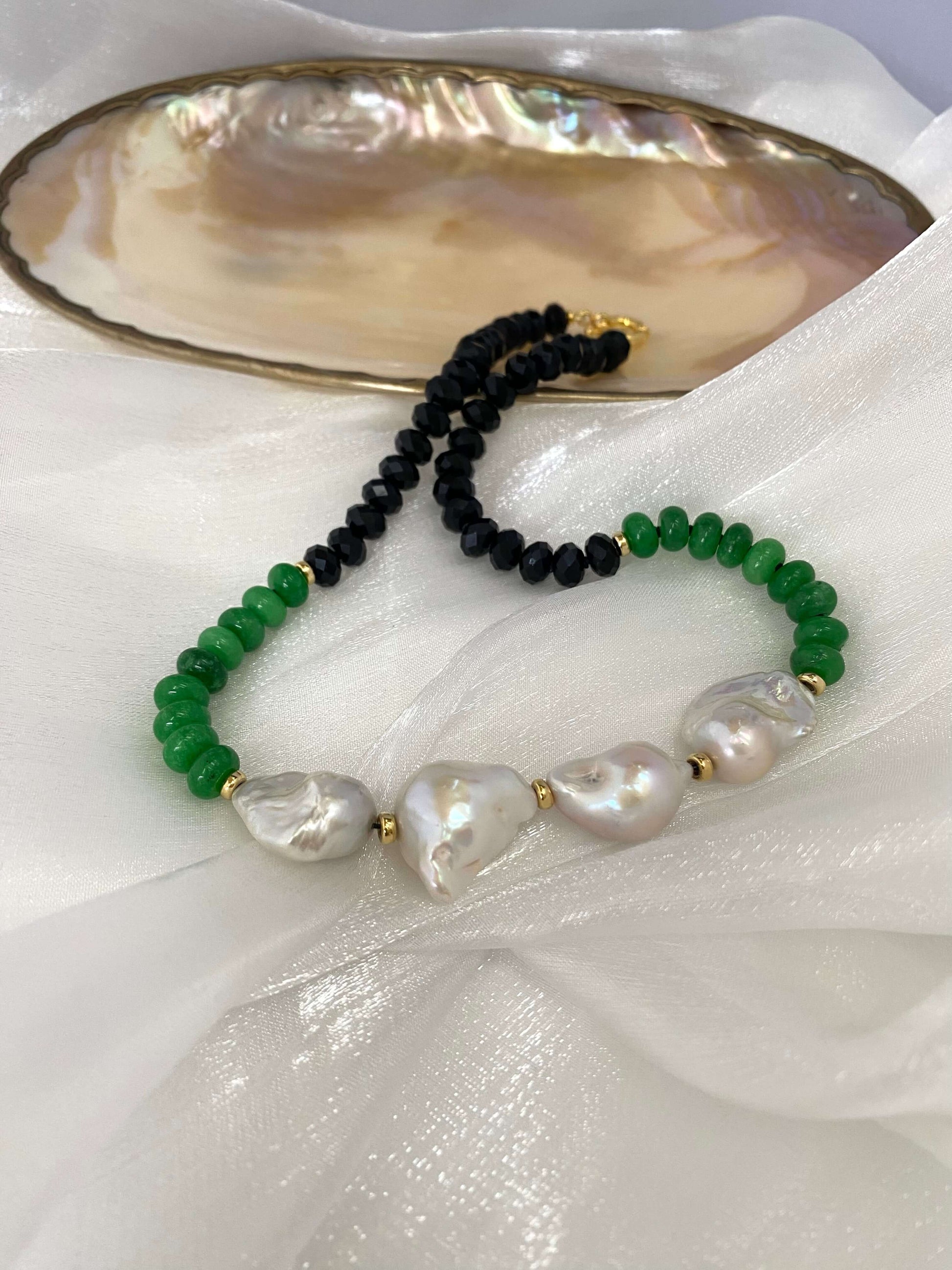 Green Jade Black Tourmaline Short Pearl Necklace showcasing black tourmaline and green jade beads with elegant pearls.