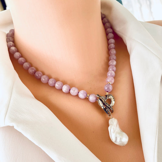 Kunzite toggle necklace with baroque pearl pendant showcasing artisan craftsmanship and delicate pink beads.