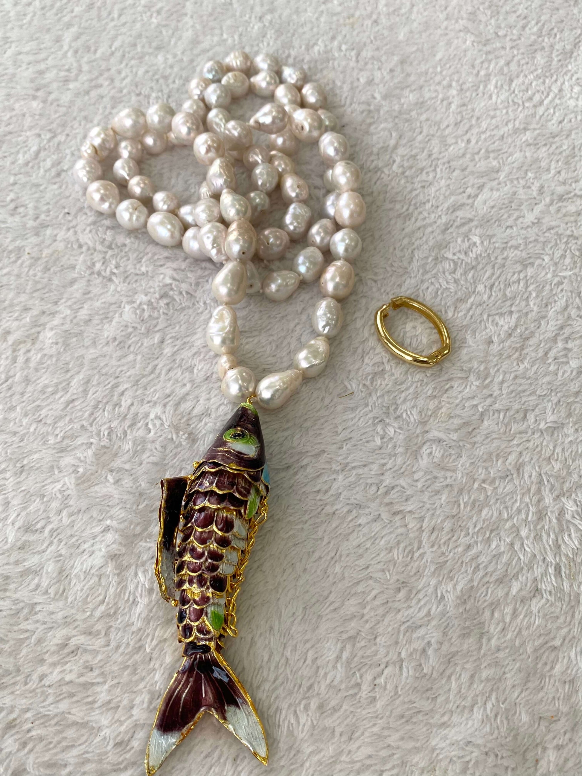 Koi fish pearl necklace with burgundy cloisonné pendant and hand-knotted baroque pearls.