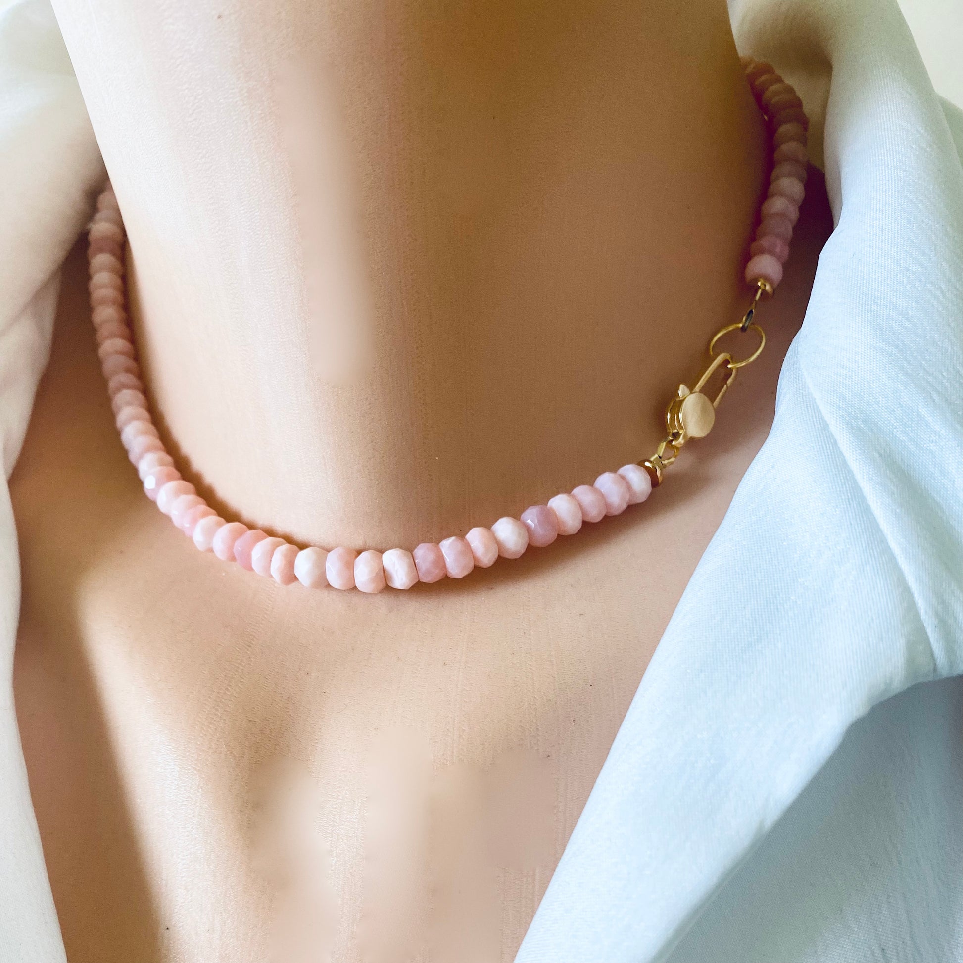 Pink opal short necklace worn alone at the neckline for minimalist everyday styling