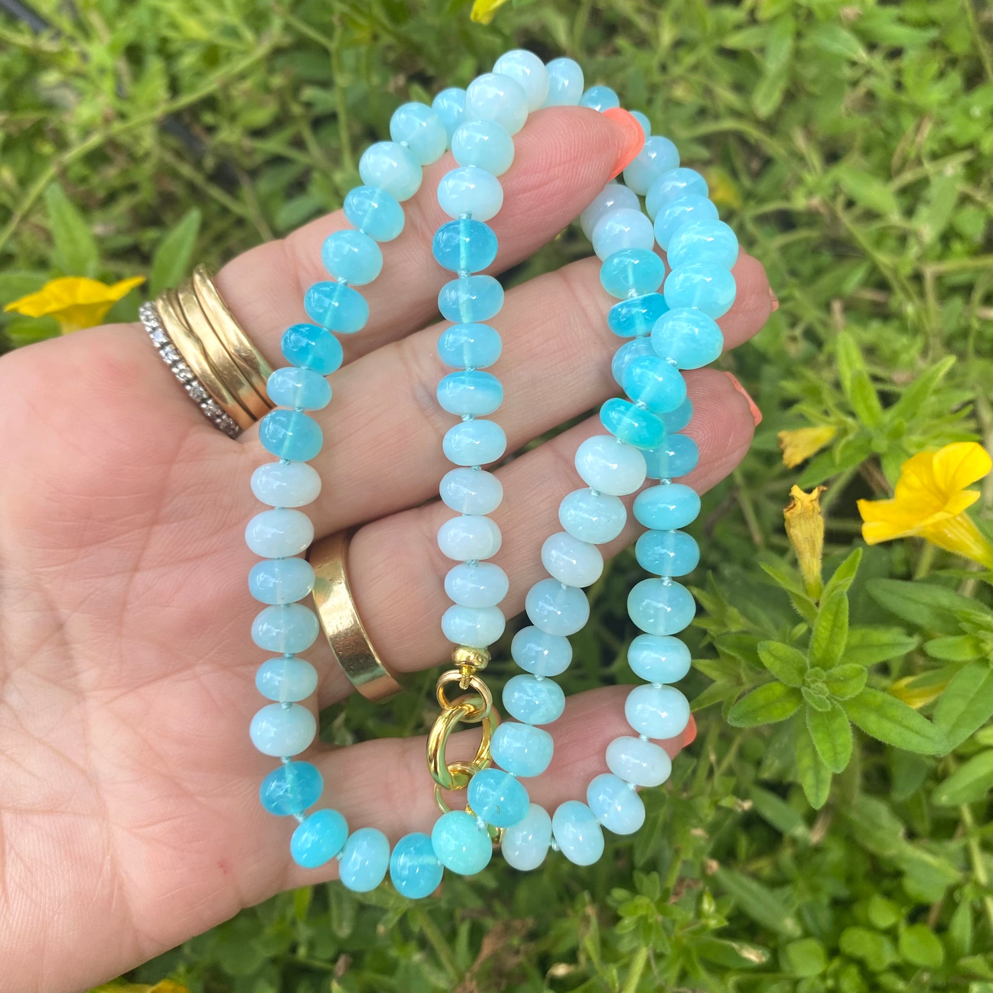 Opal candy necklace made with sky blue opal rondelle beads, showcasing luminous spring and summer colors.
