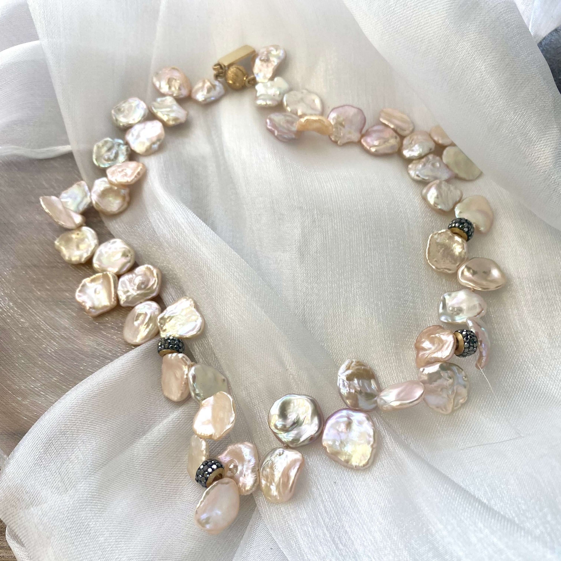 Pink lavender petal pearls choker necklace – a handcrafted piece featuring unique freshwater petal pearls.
