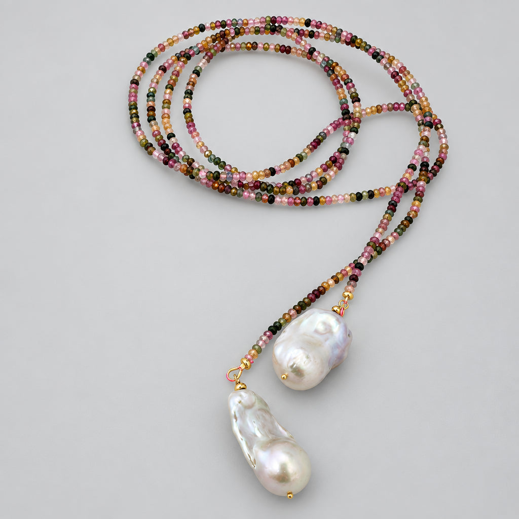 Close-up of Multi Tourmaline Baroque Pearl Lariat Necklace on white background — faceted tourmaline beads and baroque pearls handcrafted by Loulia Pearl Jewelry