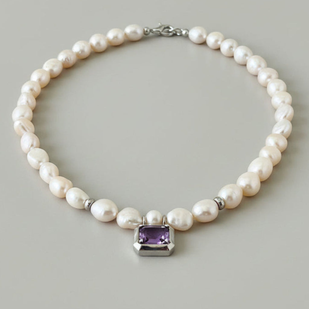 White Nugget Pearl Necklace with Amethyst Pendant – 'Viola' Collection worn elegantly.