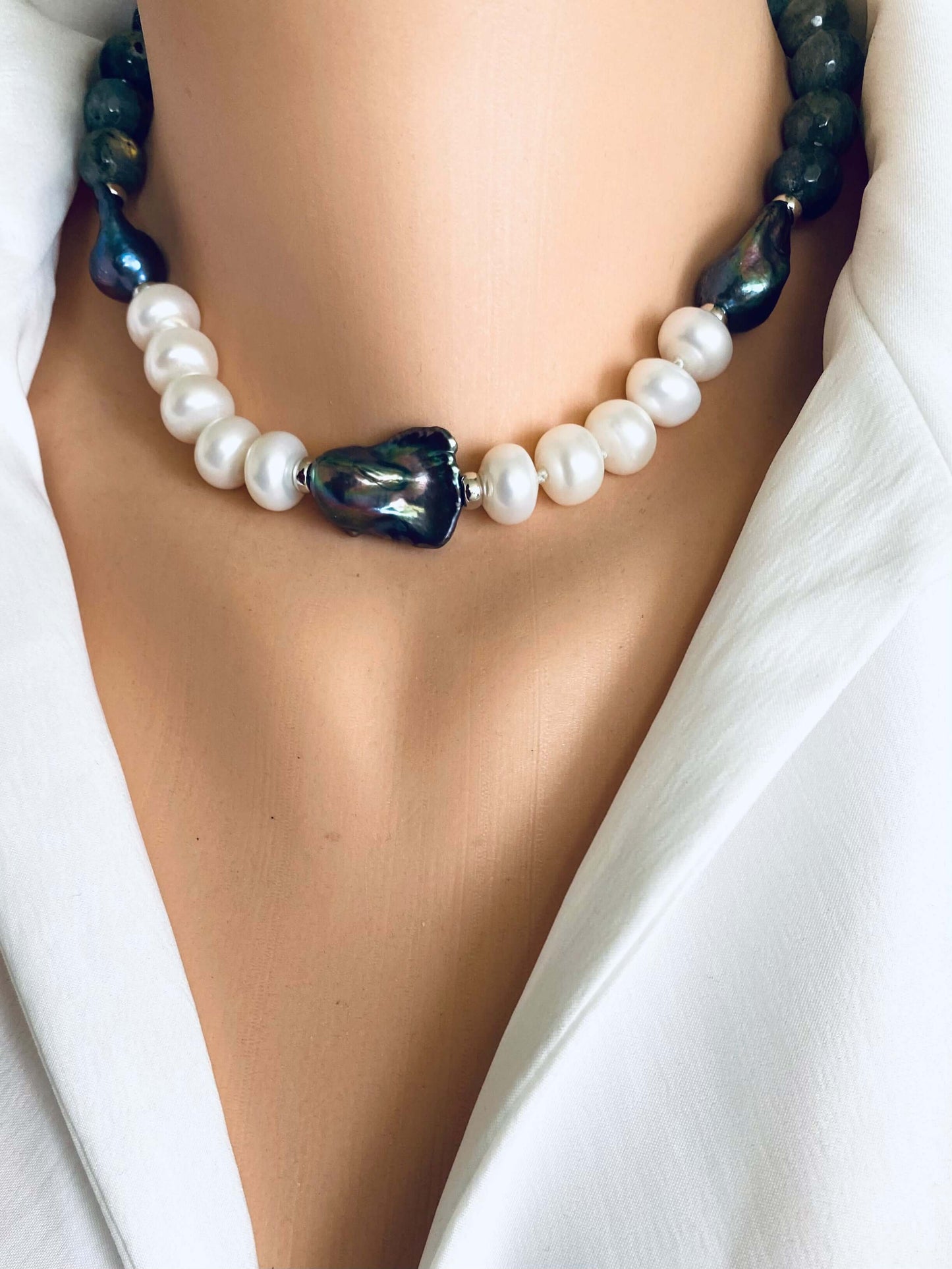 Labradorite pearl necklace with baroque and coin pearls on a mannequin, showcasing its organic elegance.