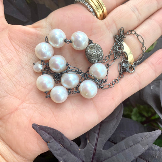 Pearl necklace wire wrapped in silver, featuring high-lustre freshwater pearls, handcrafted in Canada.