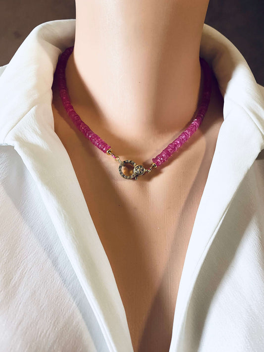 Pink topaz beaded necklace featuring gold vermeil pavé clasp, showcased on a mannequin against a white shirt.