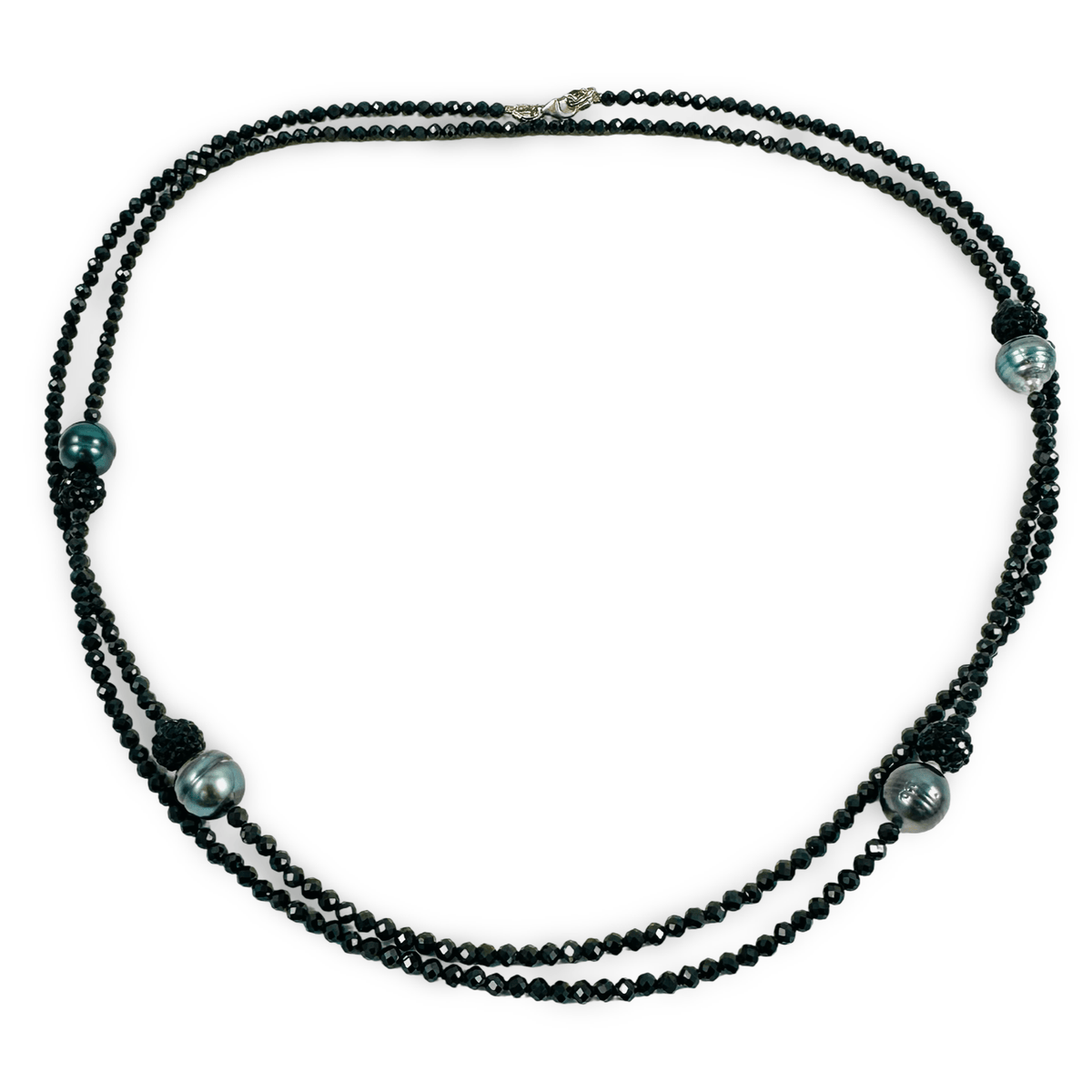 A multi-strand black beaded necklace with three large dark green-gray pearls and small black spacer beads, displayed on a clean white background.