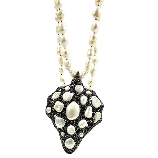 statement long pearl necklace with a jumbo pearl pendant