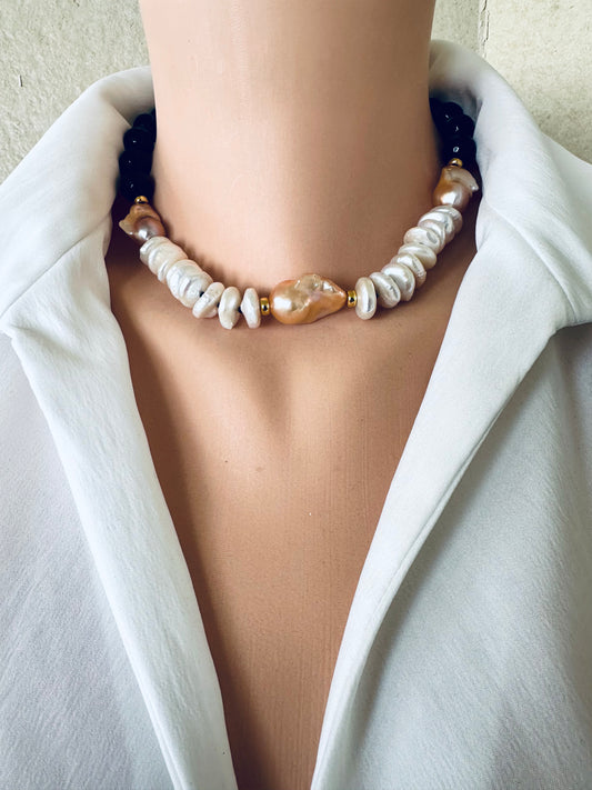 Baroque pearl necklace with black tourmaline worn at collarbone, 17 inch statement design