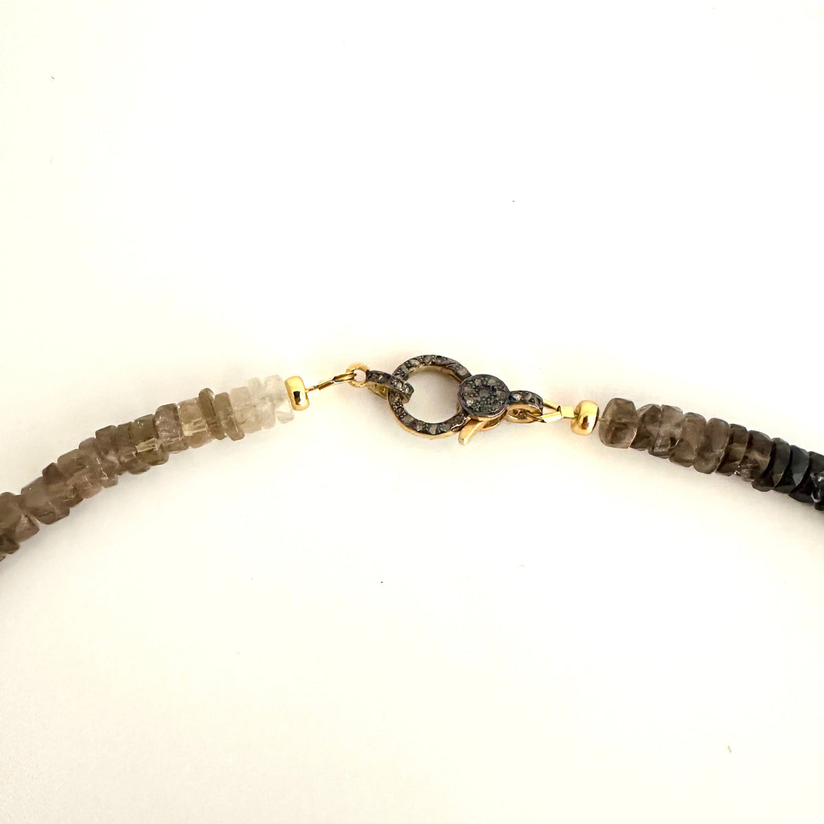 gold vermeil pave diamond sterling silver lobster clasp on white background showing how nwcklace is finished