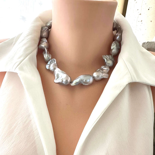 Baroque pearl necklace with silver details displayed on a mannequin, handcrafted in Canada.