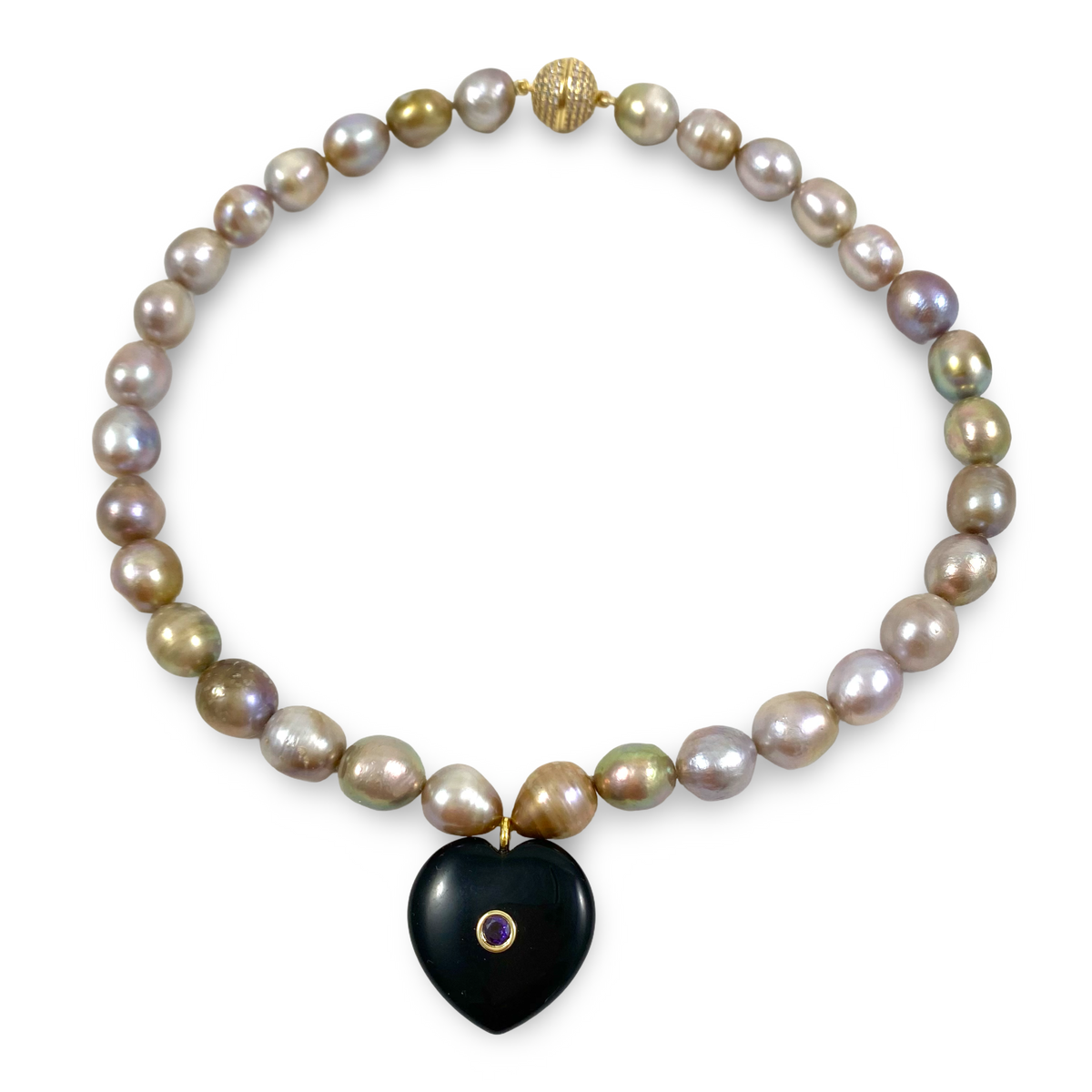 A beaded necklace featuring irregular baroque pearls in iridescent gray, gold, and purple hues, accented with a black heart-shaped pendant and gold-toned metal details, shown on a plain white background.