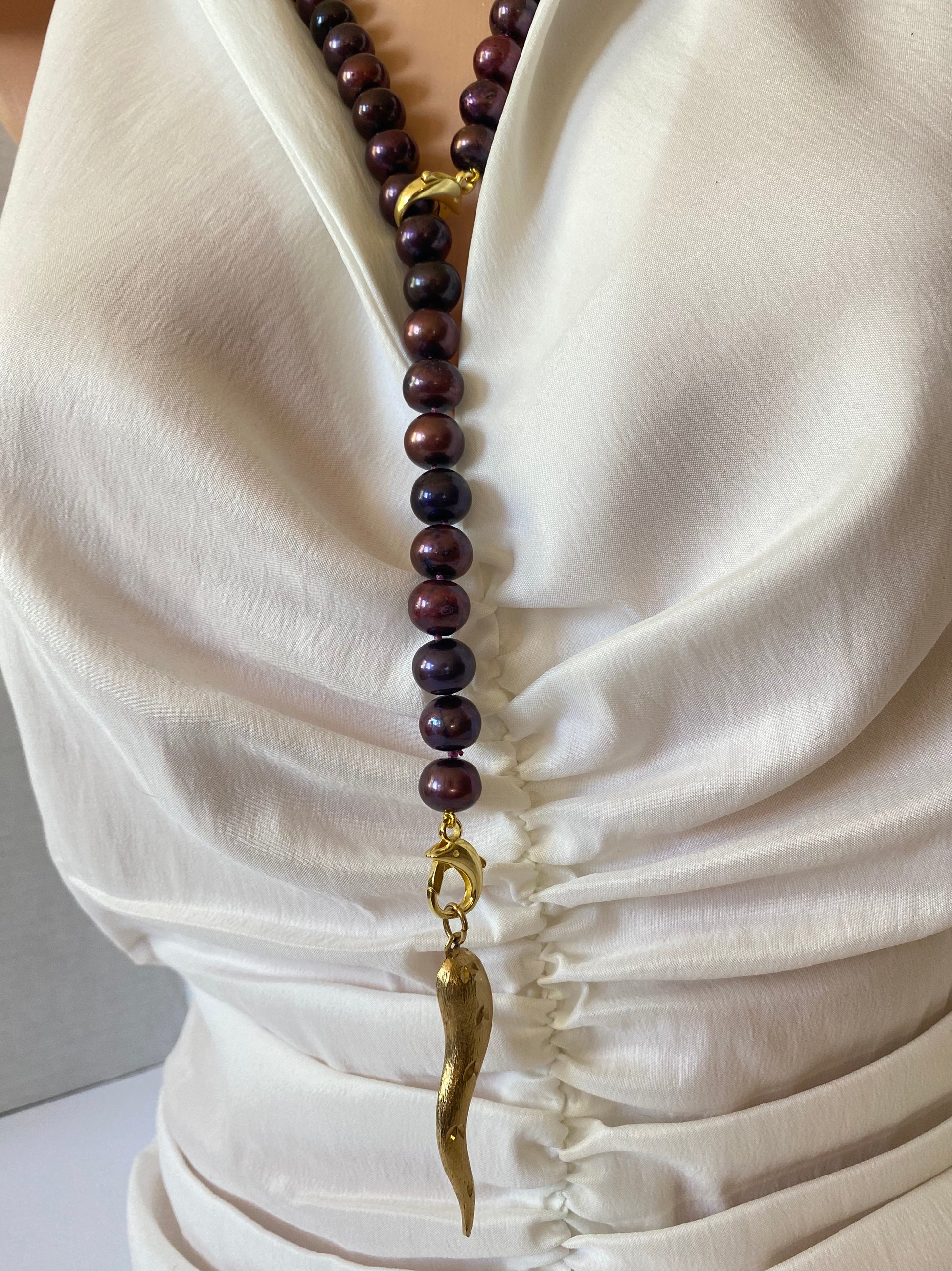 hand knotted red pearl necklace in the shape of Y with added pendant
