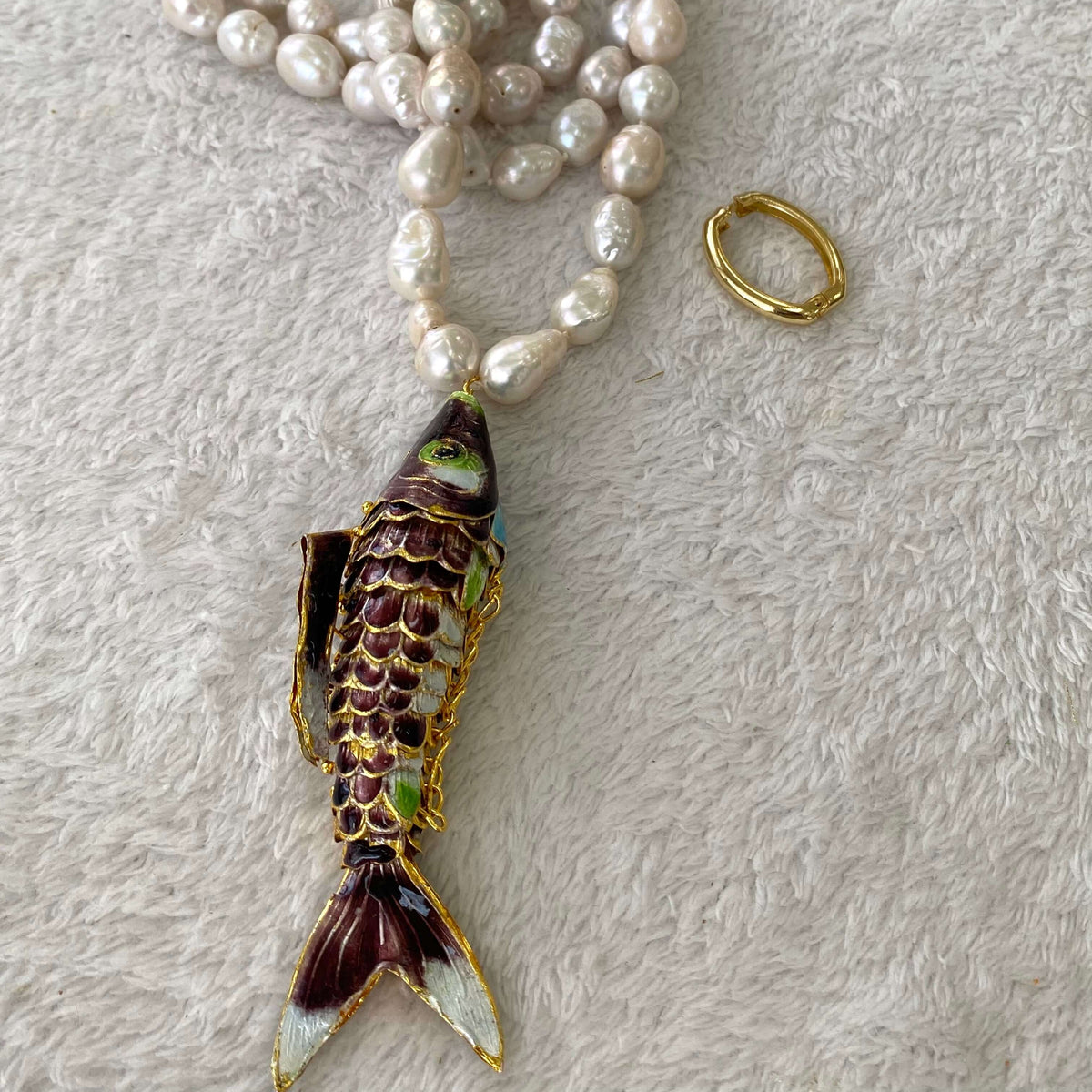 Koi fish pearl necklace with burgundy cloisonné pendant and hand-knotted baroque pearls.