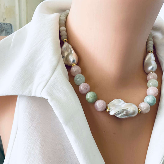 Close-up angled view of morganite and jade necklace with baroque pearls on mannequin, showing soft pink and green gemstones.