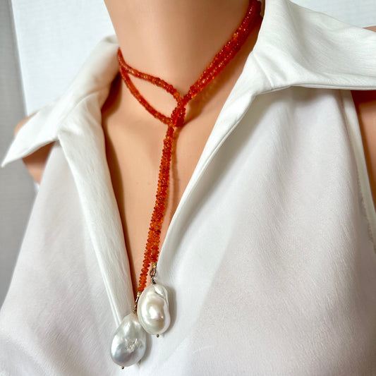 orange beaded lariat-wrap style necklace with two large baroque pearls,