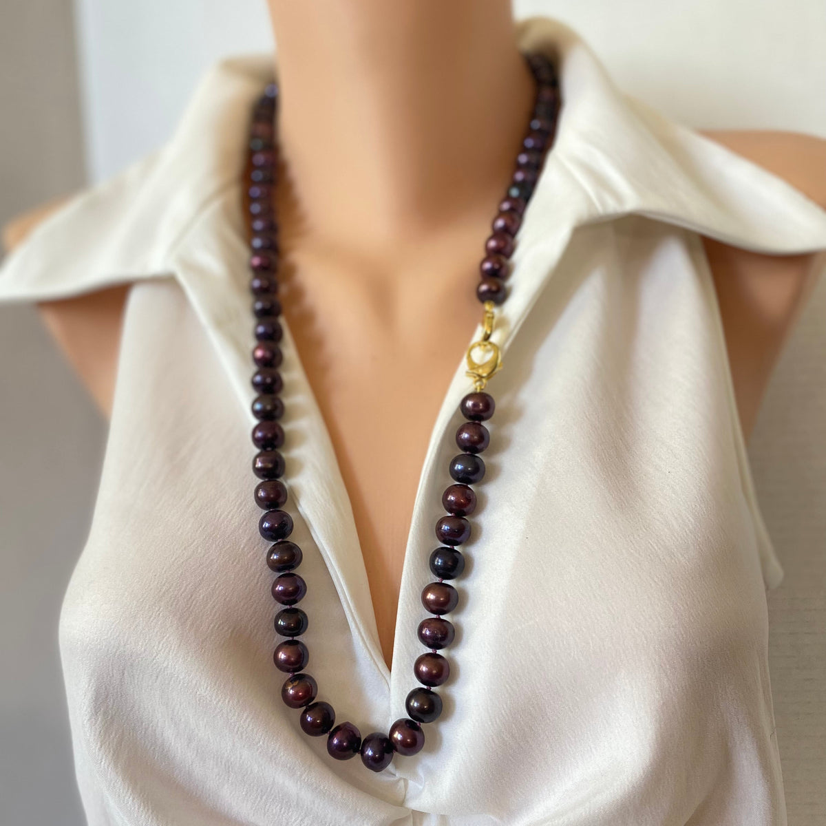 matinee plum pearl necklace worn long