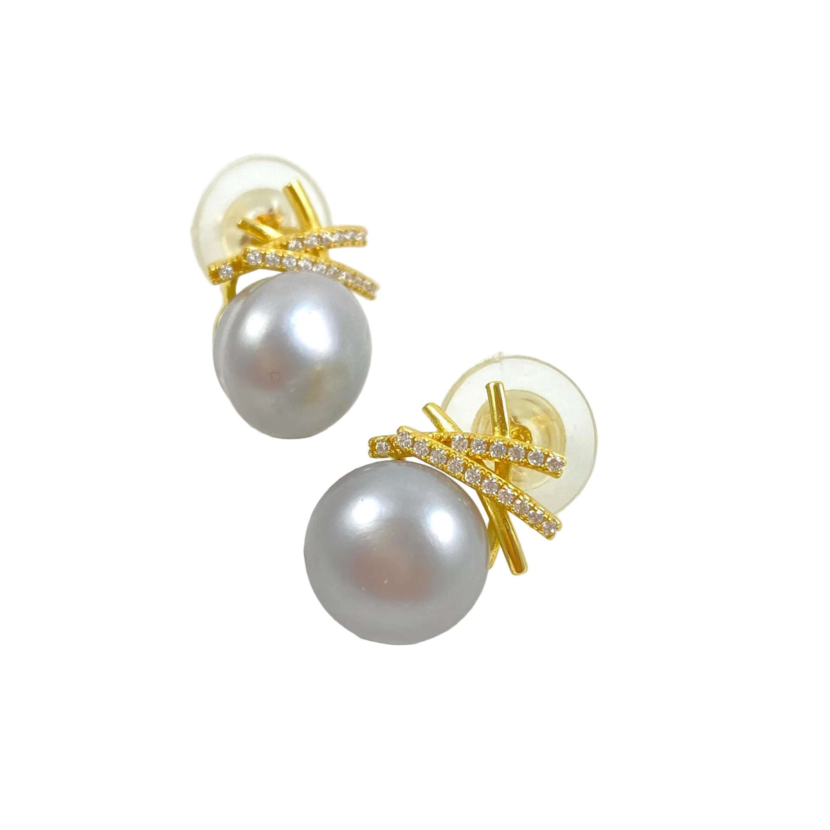 A pair of gold stud earrings featuring a large gray pearl and a gold bow-shaped setting accented with small clear crystals, shown on a white background.