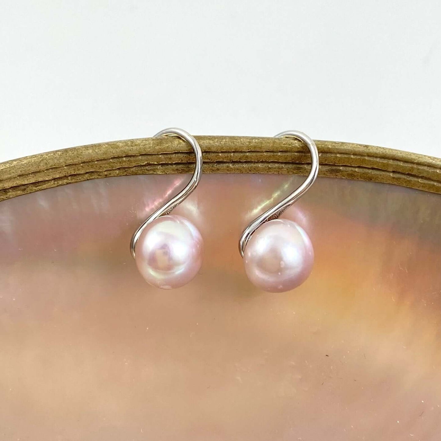 small and classy soft pink pearl earrings, silver settings