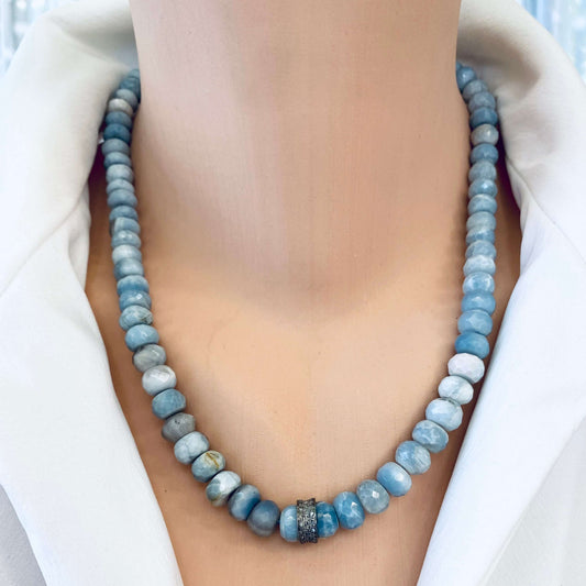 Boulder opal diamond necklace worn on neckline with shaded blue grey opal beads