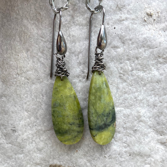 Handmade green serpentine teardrop earrings showcasing natural gemstone patterns