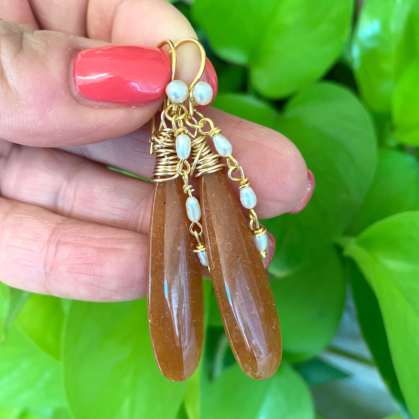 Red Aventurine Pearl Earrings featuring unique orange-red stones and delicate pearl accents, handmade in Canada.
