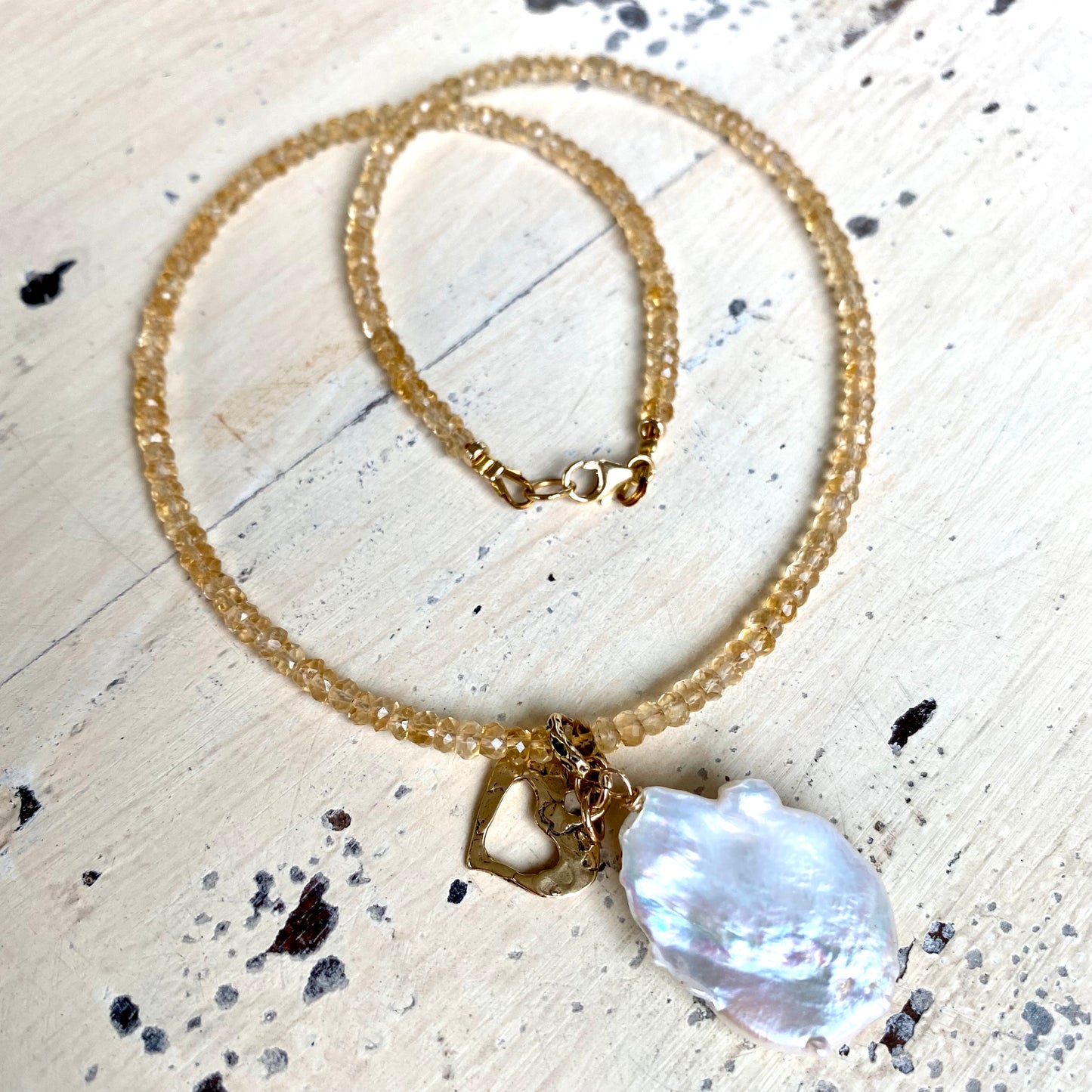 Citrine pearl necklace with artisanal gold bronze heart charm and large freshwater baroque pearl