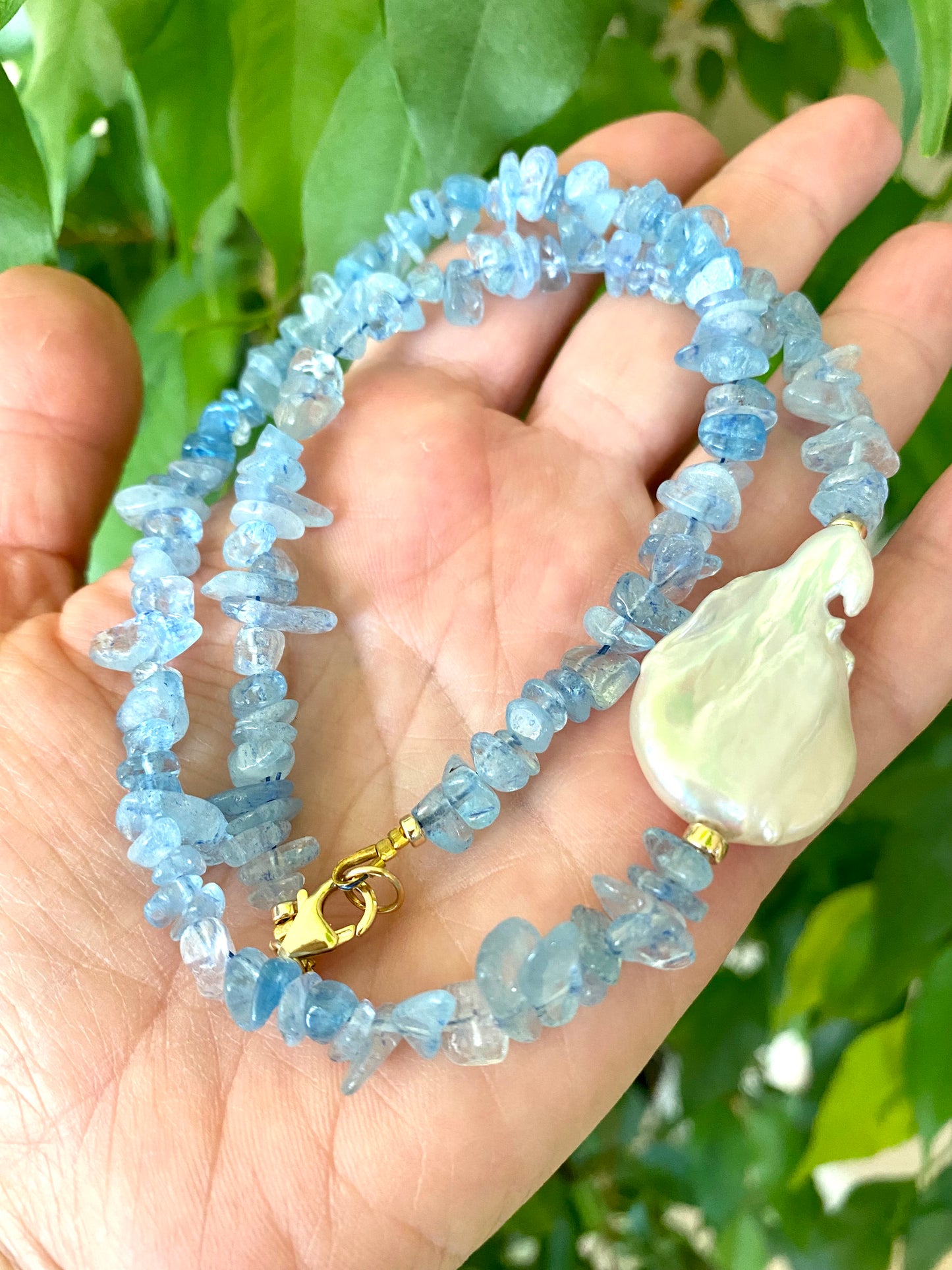 Aquamarine pearl necklace handmade in Canada with blue aquamarine chips and baroque pearl