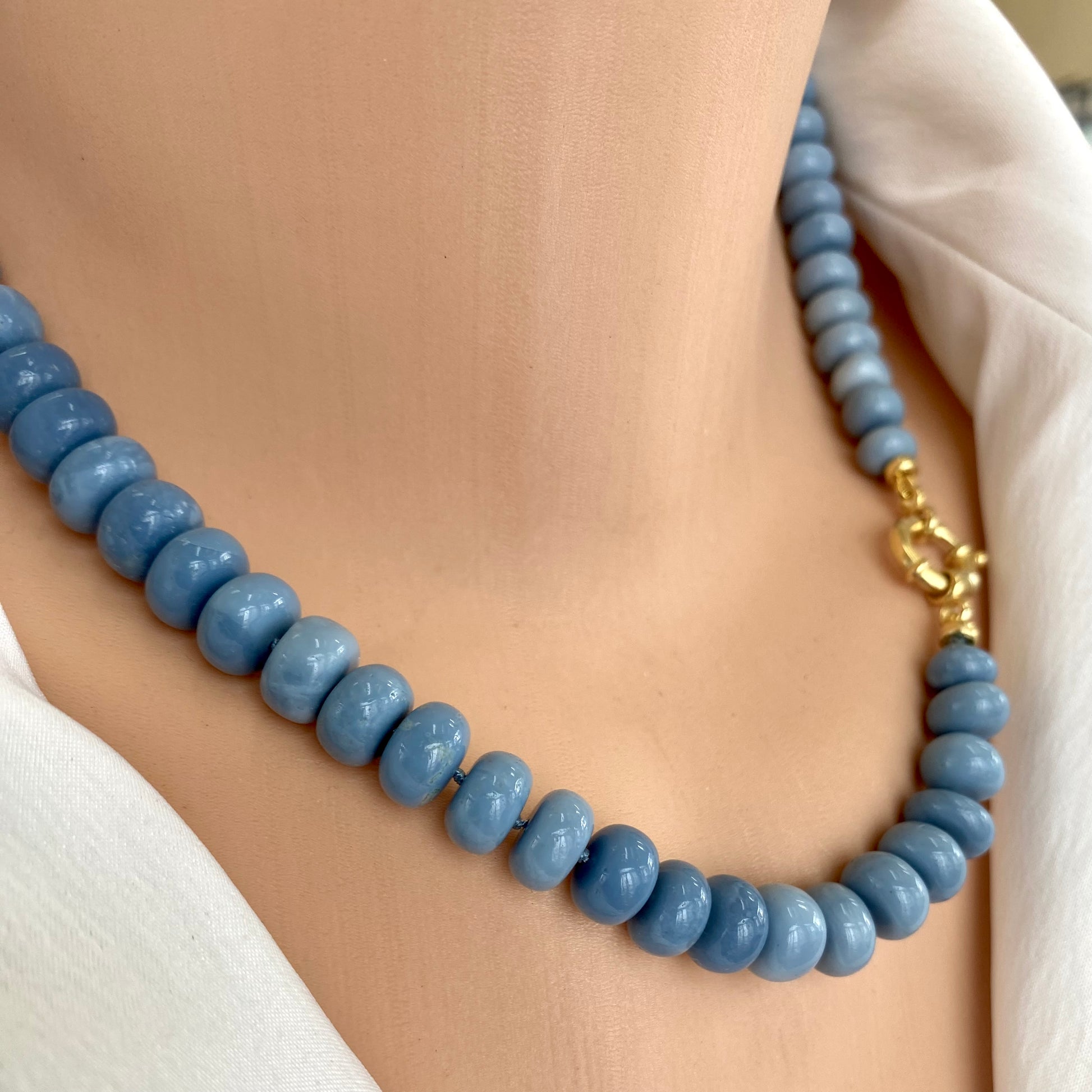 Blue opal necklace close-up on model, lightweight hand-knotted blue opal bead strand