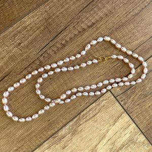 Hand knotted pearl necklace