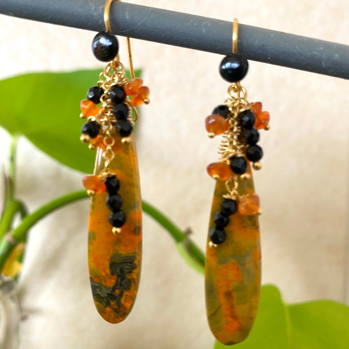 Bumble Bee Jasper Earrings with Carnelian and Onyx Clusters showcasing bold yellow, orange, and black patterns.
