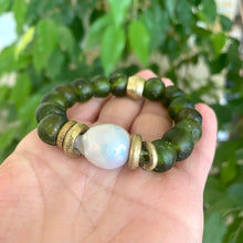 Load image into Gallery viewer, Bracelet showcasing Chunky Baroque Pearls, Olive Green African Tribal Glass, and Stretch Fit
