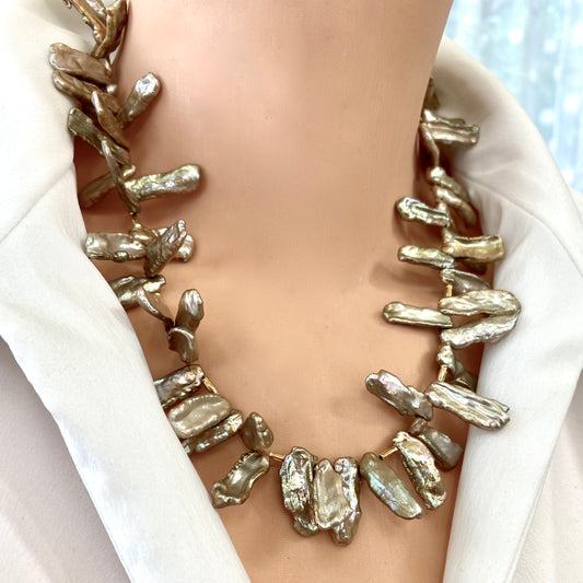 Champagne pearl necklace worn on model, Biwa keshi stick pearls with warm champagne iridescence