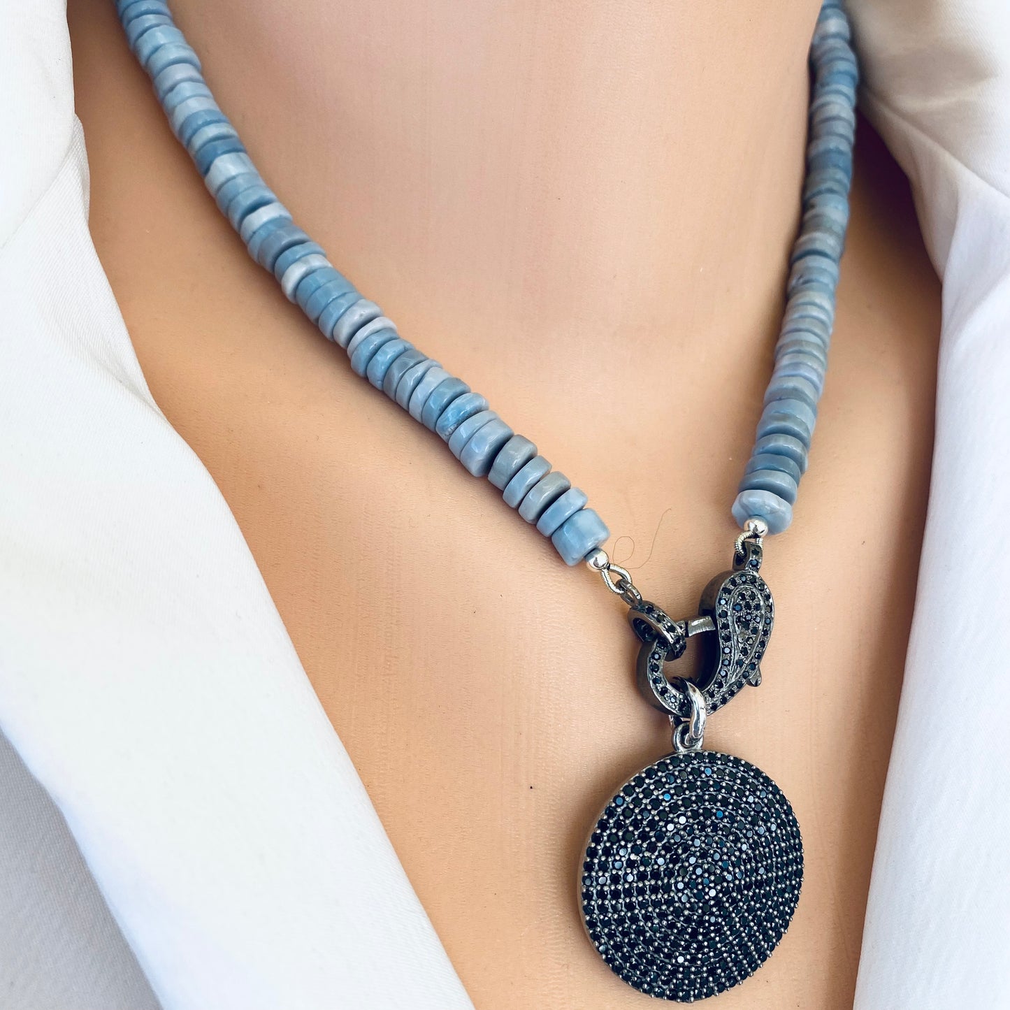 Oregon blue opal candy necklace worn on neck with black spinel pavé pendant, handmade in Canada